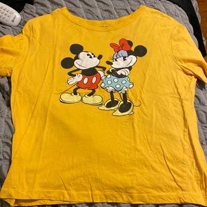 Disney Mickey and Minnie shirt that fits like a medium but is a large